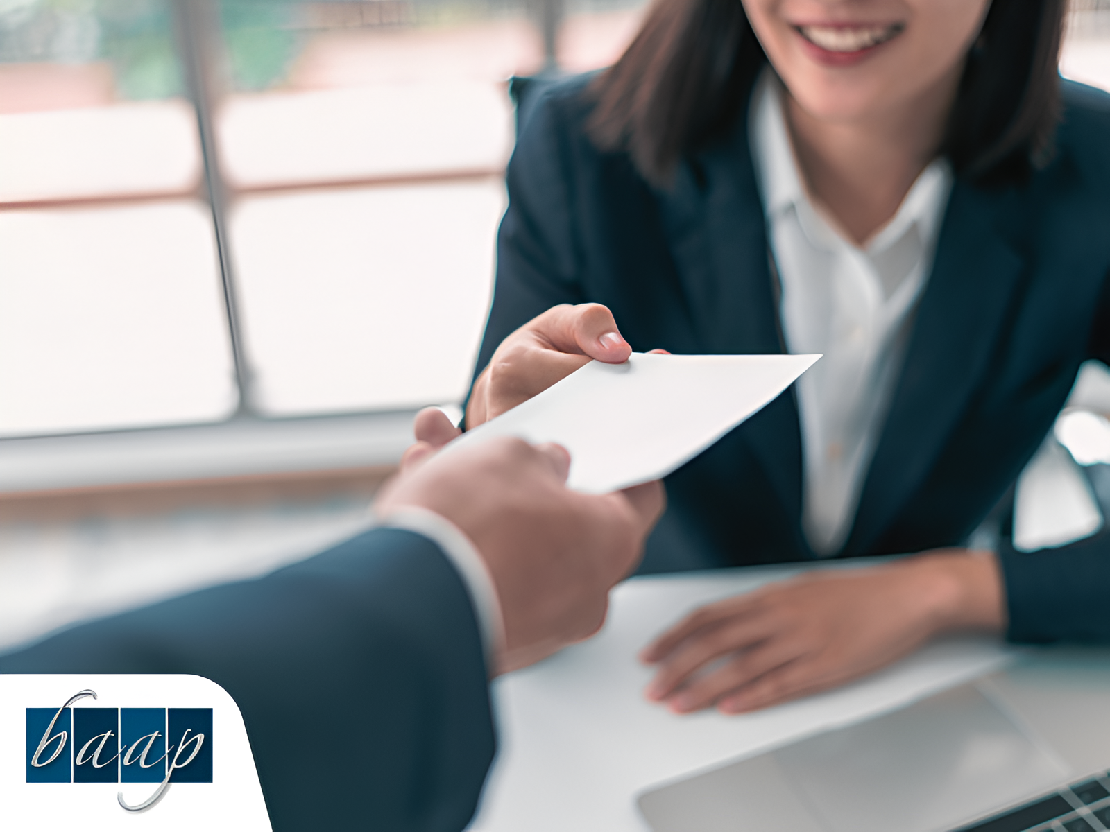 Business owner receiving paycheck envelope from